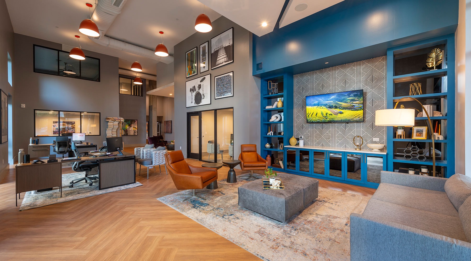 Aspire Gulch clubhouse lounge area with seating and tv